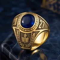 Anillo de graduación en oro con piedra azul